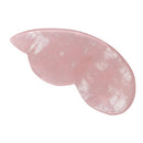Gua Sha Rosenquarz „Kürbis“ von Vives de la Cortada S.L, Massagewerkzeug aus rosa Quarz in Kürbisform, nah aufgenommen