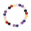 Vives de la Cortada SCP Mix Chakras Armband mit glatten 8 mm Kugeln aus Schmuckmaterial auf weißem Hintergrund
