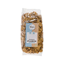 Eine 250-g-Packung „Braunhirse Flakes“ von Govinda mit glutenfreiem Bio-Siegel, freigestellt auf weißem Hintergrund.