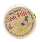 Eine runde beige yoni bliss kräuterbalsam dose mit floralem etikett und roter markenbeschriftung