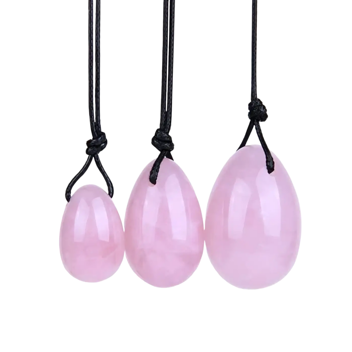 Rosenquarz Yoni-Eier mit Bohrung, 40 x 25 mm, drei pinkfarbene Harmonie- und Wellness-Accessoires von Artisans de Madagascar