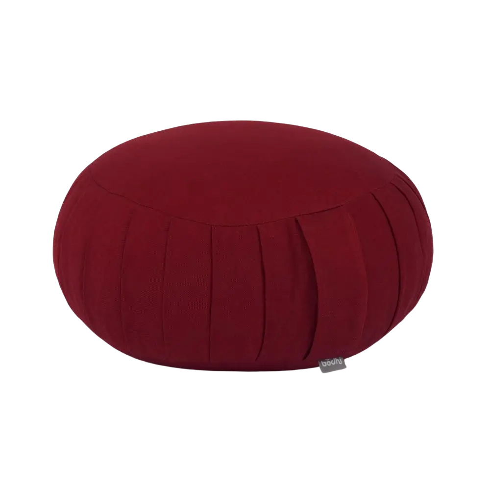 Ein plushes tiefrotes zafu eco meditationskissen aus dinkel mit feiner vertikalnaht im mana shop