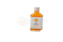 Eine klare glasflasche mit goldfarbenem schraubverschluss und kurkuma bio 100ml zahnöl zur zahnfleischregeneration von zilani sahil