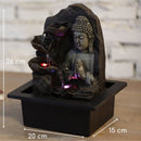 Ein beleuchteter Buddha-Zimmerbrunnen mit seinen Maßen: 26 cm hoch, 20 cm breit und 15 cm tief.
