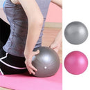 Zwei Zen'Arome Yoga- und Pilatesbälle in Rosa und Grau, Durchmesser 25 cm, auf einer mattenähnlichen Oberfläche.