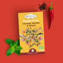 Bio-Kräutertee Fire Energy von Zen'Arôme mit Schokolade, Minze und Chili, dampfend in einer Tasse.
