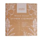 Braune kraftpapierschachtel mit weißen botanischen motiven enthält zen duschdampfer mood boost shower steamers mit grapefruit, bergamotte, rosmarin und zitronenverbene