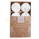 White circular zen shower steamers with green herb sprinkles in brown box labeled ancient wisdom mood boost shower steamers