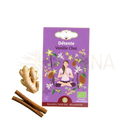 Lila rechteckige box bio-kräutertee entspannung chai vanille mit meditativer frau umgeben von blumen und gewürzen