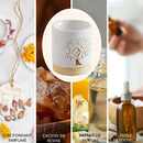 Weiße keramik duftlampe zen’arome mit goldbesetztem sockel und lebensbaum céramy life tree design