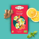 Ein rotes rechteckiges paket zen’arôme focus organischer kräutertee mit basilikum, ingwer und orange für sanfte konzentration