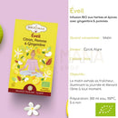 Bright yellow rectangular box of shotima organic awakening kräutertee with citrus apple and ginger flavor and 16 beutel