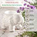Weißes keramisches elefantenförmiges tandor wax wax warmer mit dekorativen perforationen und glänzender oberfläche