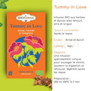 Orange verpackung vom shotima tummy in love organischer kräutertee für entspannende momente mit fenchel anis oregano