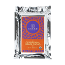 Eine kräftig orange und lila verpackte zeremonieller kakao paste 100% arriba nacional cacao paste 1kg aus ecuador im silbernen folie