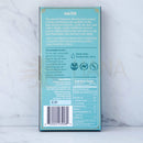 Teal farbige rechteckige zeremonieller kakao box mit goldrand und weißem text zu sacred elements blends mit arriba nacional