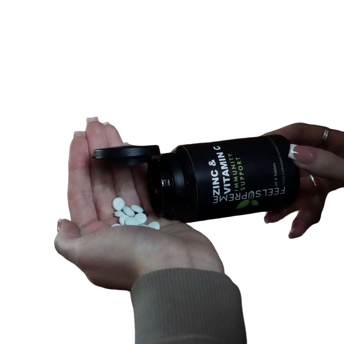 Nahrungsergänzungsmittel Zink mit Vitamin C von Feel Supreme zur Unterstützung des Immunsystems, in einer Schachtel mit Tabletten.
